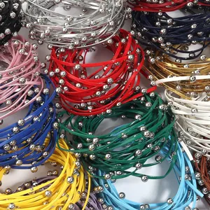 Multi-strand leather cord necklace with tiny silver beads in multiple vibrant color options.