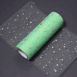 Green sequin tulle mesh roll detail close-up for DIY crafts, party decor, and apparel sewing.