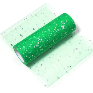 Green glitter tulle mesh roll detail showing sparkling sequin texture for DIY craft and decor.