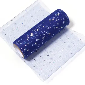 Royal blue glitter tulle fabric roll for DIY crafts, wedding dresses, and party decorations.