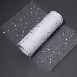 White holographic sequin tulle roll fabric, perfect for DIY wedding dress party decoration and crafts.