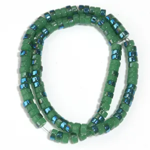 Green electroplated glass rondelle spacer beads detail, perfect for DIY jewelry making.