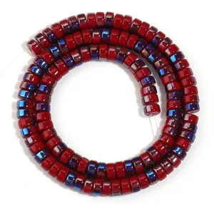 Glass rondelle beads detail view, vibrant red electroplated blue AB color for DIY jewelry.