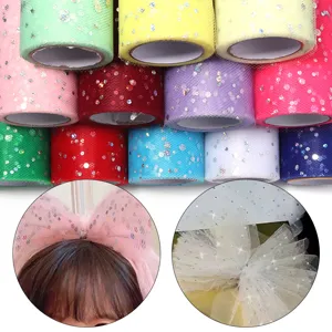 Colorful glitter tulle fabric rolls for DIY bows, wedding dresses and party decorations.