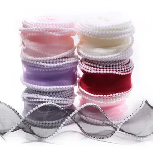 Pearl edge chiffon ribbon roll for gift wrapping, bouquet packaging and DIY craft decor.