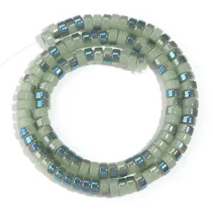 Green electroplated glass wheel bead detail shot for DIY jewelry making and bracelet accessories.
