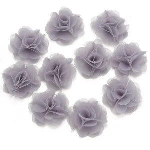 Close-up detail of grey chiffon flower lace trims, perfect for DIY hair accessories and apparel.