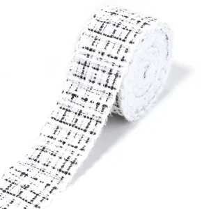 Black and white tweed ribbon trim for DIY crafts, hair bows, clothing accessories, gift wrap.