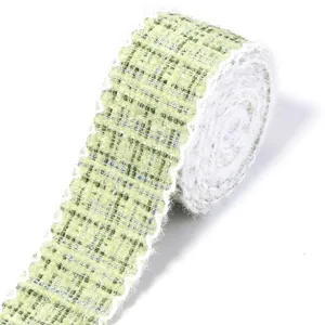 Green tweed style ribbon with white lace edge for DIY crafts, gift wrapping and garment sewing.