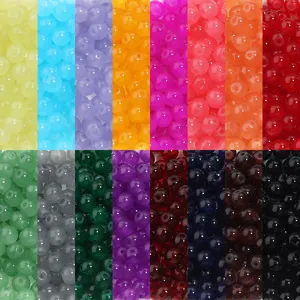 Perles rondes en verre colorées en vrac pour la fabrication de bijoux et loisirs.