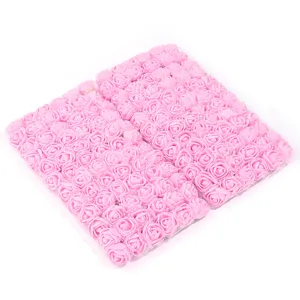 Artificial PE foam rose flower heads with mesh tulle decoration for wedding and party decor.