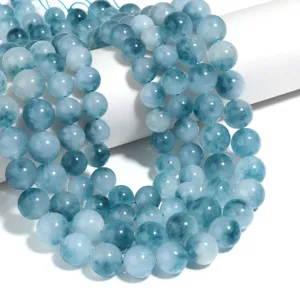 Perline tonde in calcedonio azzurro naturale per creazione di gioielli fai da te e bracciali.