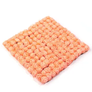 Detailed view of artificial PE foam rose flower heads with mesh for wedding and home decor.