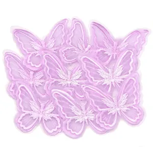 Close up of double layer 3D lace butterfly embroidery patches in light purple for DIY crafts