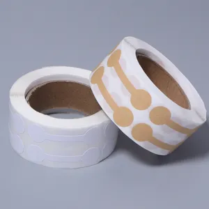 Detailed close-up shot of barbell-shaped sticky paper labels rolls for jewelry pricing.