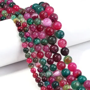 Detailed view of colorful cracked dragon vein agate round beads, perfect for DIY jewelry making.