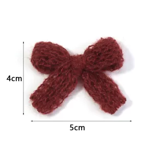 Knitted wool bow hair clip DIY accessory, dark red handmade garment craft material.