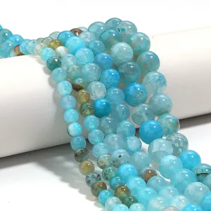 Blue dragon vein agate round loose beads detail macro shot, ideal for DIY jewelry crafting.