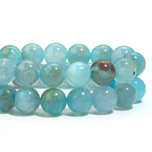 Blue crackle agate round beads detail shot, ideal for DIY handmade jewelry bracelets.