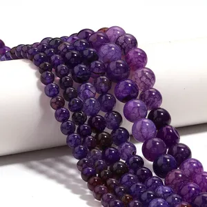 Natural purple crackle agate gemstone round beads for DIY jewelry making and bracelet design.