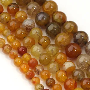 Close-up detail shot of natural crackle agate round beads, perfect for DIY jewelry making.