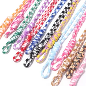 Colorful woven lanyard strap for keychains and bag charms, stylish handmade nylon rope accessories.