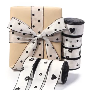 Nastro trasparente con pois, fiori e cuori neri per confezioni regalo, fiocchi e progetti creativi.