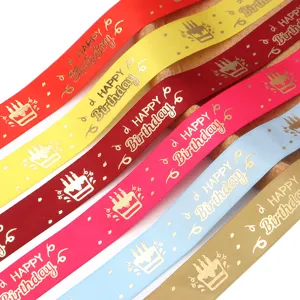 Colorful polyester ribbon with gold stamped birthday design for gift wrapping and party decor.