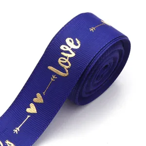 Blue gold foil love print polyester ribbon detail for DIY gift wrapping and bows craft decor.