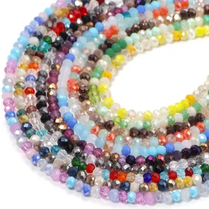 Close-up of vibrant mixed color faceted crystal glass beads, ideal for DIY jewelry crafting.