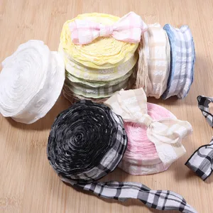 Polyester bubble plaid pleated ribbon rolls for DIY bows, gift boxes, and garment sewing crafts.