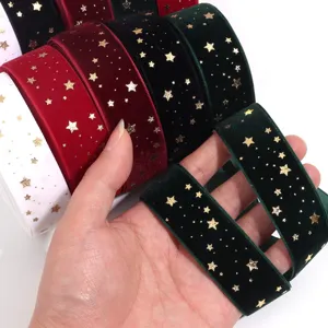 Christmas velvet ribbon with gold star flocked design for DIY hair bows and gift wrapping.