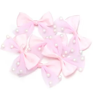 Pink ribbon mesh bow with faux pearls, DIY craft hair accessories and clothing apparel decor items.