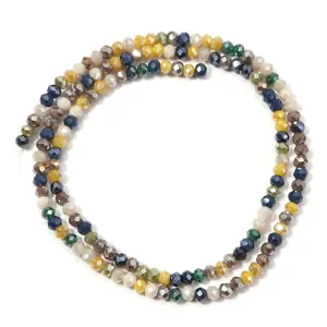 Close-up of colorful faceted crystal glass beads, ideal for DIY jewelry making and beading.