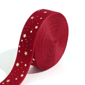 Red velvet ribbon with gold foil stars, perfect for Christmas DIY bows, hair clips, and gifts.