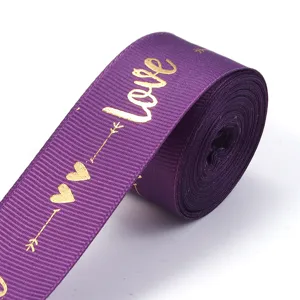 Purple polyester ribbon with gold foil Love print, ideal for DIY gift box packaging and bows.