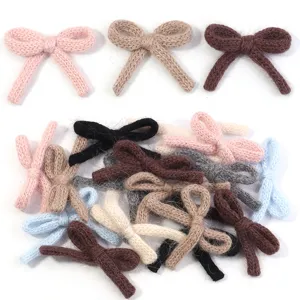 Cute knitted bow DIY accessories, plush cotton ribbon hair clips, sweet colorful craft supplies.