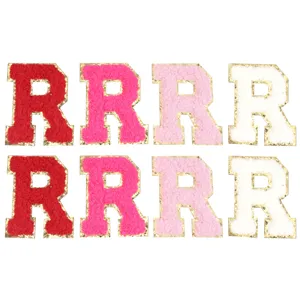 Toppe con lettera R in ciniglia colorata con bordo glitterato dorato per accessori fai da te.