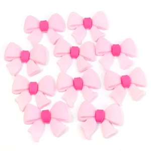 Roze PVC strik bedels voor DIY haarspelden telefoonhoesjes en clogs decoratie accessoires