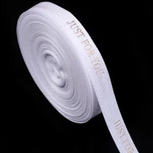 Λευκή υφασμάτινη κορδέλα grosgrain σε ρολό με χρυσή εκτύπωση για δώρα και χειροτεχνίες.