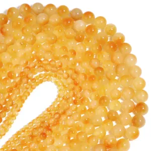 Perle sfuse rotonde in calcedonio giallo naturale per creazione di gioielli fai da te e bracciali.
