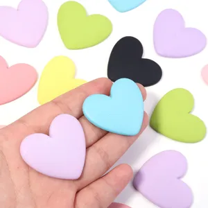 Resin heart flatback charms for DIY phone case and hairpin decoration, colorful cute craft pieces.