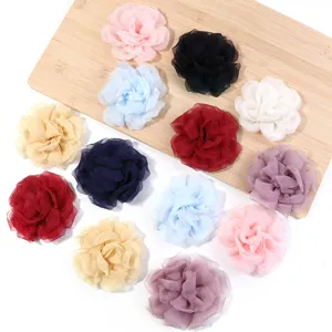 Close-up of multi-color mesh fabric rose flowers for DIY crafts apparel accessories