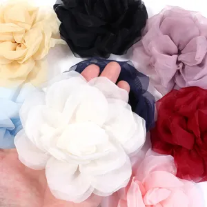 Closeup of double layer mesh chiffon rose flower craft accessories in assorted colors detail view.