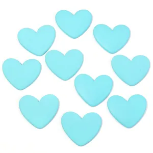 Resin heart flatback details, light blue DIY accessories for phone cases and hair clips.