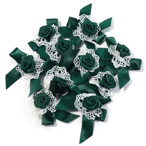 Dark green satin ribbon rose bows with white lace trim for DIY Lolita hair accessories.