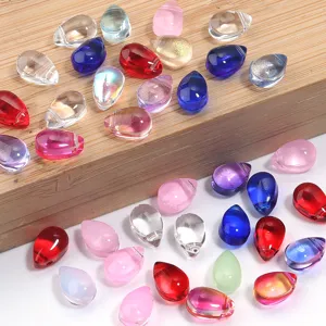 Close-up colorful teardrop glass beads for DIY jewelry making and hair accessories detail view.