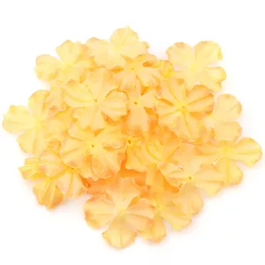 Yellow artificial fabric flower petals for DIY crafts hair clips and clothing accessories.