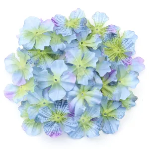 Detailed shot of blue gradient fabric flower petals, perfect for DIY crafts and hair accessories.