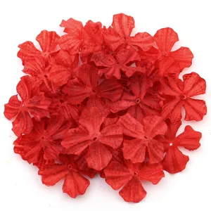 Red four-petal fabric flower patches, ideal for DIY handmade crafts, hair clips and apparel.